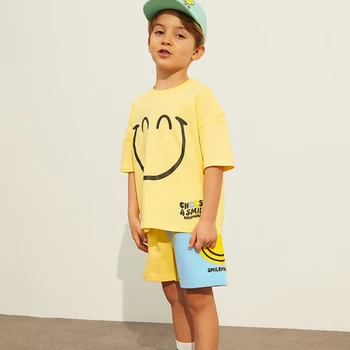 קוריאה תינוק בקיץ בגדים מזדמנים קבוצות ילדים חדשים חיוך להדפיס חולצה + מכנסיים כחולים 2Pcs מתאים לילדים אימונית תלבושות