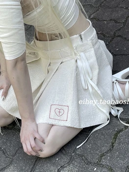 קוריאני חדש עיצוב קשת הצלב אהבה רקמה עלייה נמוכה קפלים החצאית תלמיד תיכון לבן גותי חצאיות מיני Y2k נשים בגדים