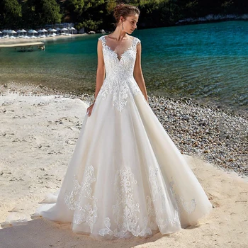 שופע בתוספת גודל שמלות חתונה תחרה ללא שרוולים אפליקציה אשליה חוף שמלת חתונה וינטג ' קו נסיכה שמלות כלה